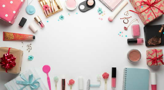 Flat lay of birthday gifts for 14-year-old girls featuring makeup, beauty products, jewelry, notebooks, and wrapped presents on a white background.