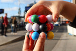Meffert's Molecube - 9-Color Cube for Pattern-Solving Fun