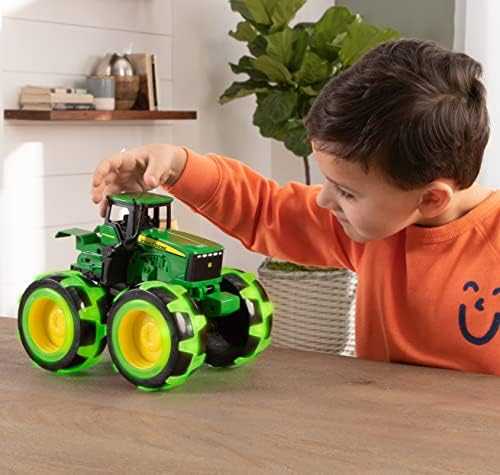 TOMY Monster Treads John Deere Tractor with Light-Up Wheels